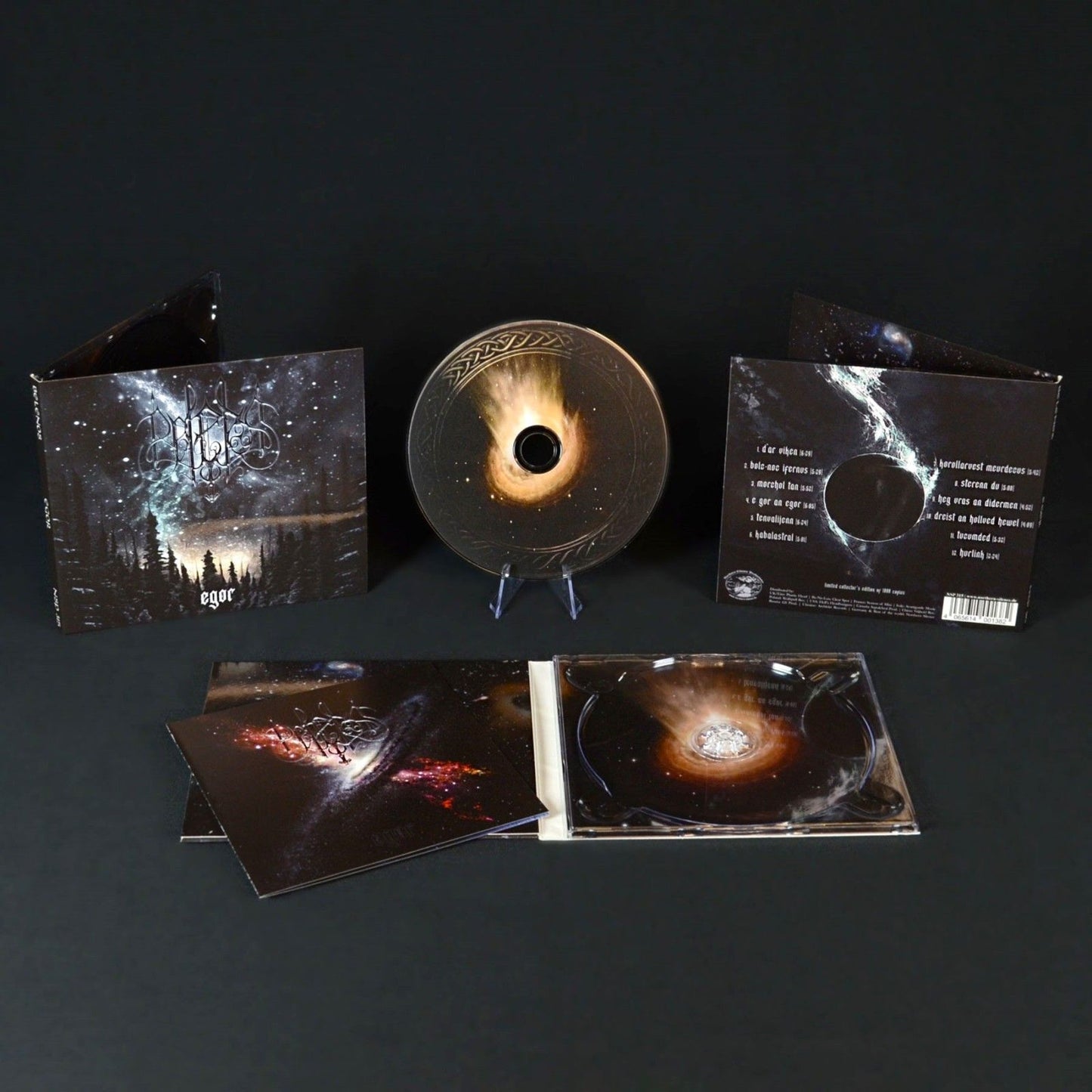 Photo of CD with 4-panel digipak, shown fully open, and at multiple angles