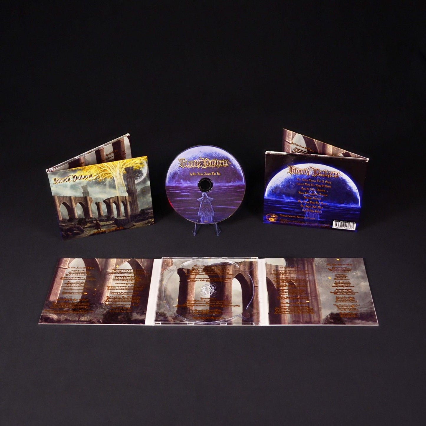 Photo of CD with 6-panel digipak, shown fully open, and at multiple angles