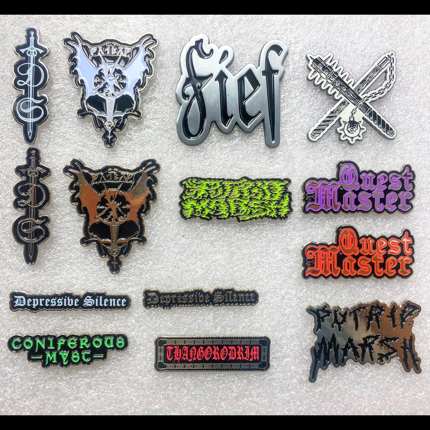 Fief enamel pin, among a selection of enamel pins