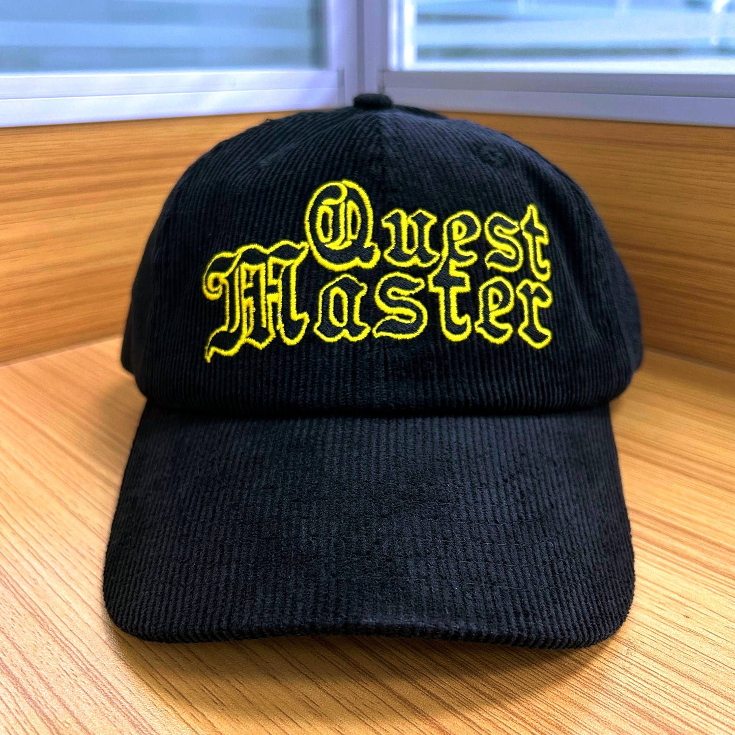 QUEST MASTER "Fantasy Synthesizer Music" Embroidered Corduroy Dad Hat, black cap with yellow embroidery (unavailable)