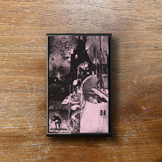 Cassette tape with a black and pink cover on a wooden surface