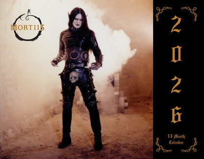 Person in dark, stylish clothing with 'Mortiis' branding and '2026' on a textured background.