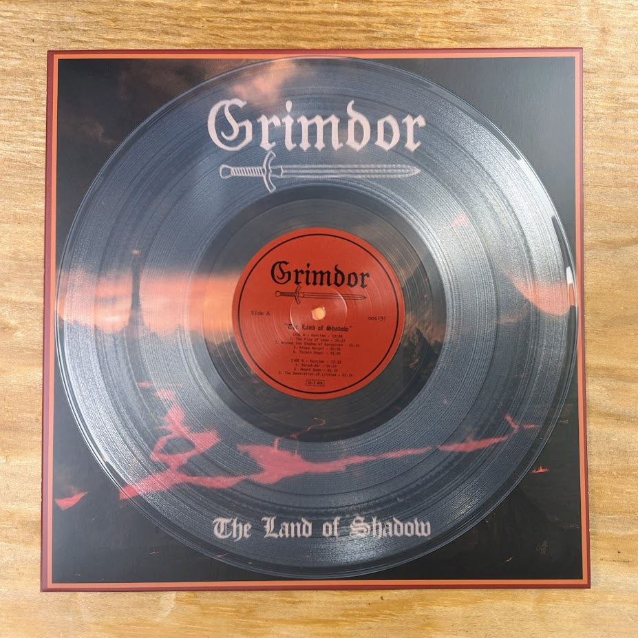 GRIMDOR "The Land of Shadow" vinyl LP, clear vinyl with printed record jacket and insert, clear vinyl detail
