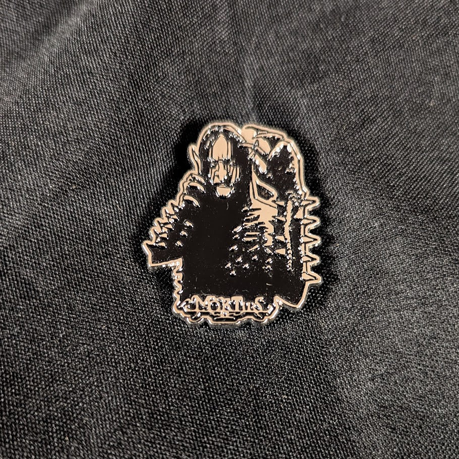 Metal enamel pin, silver metal with black detail.