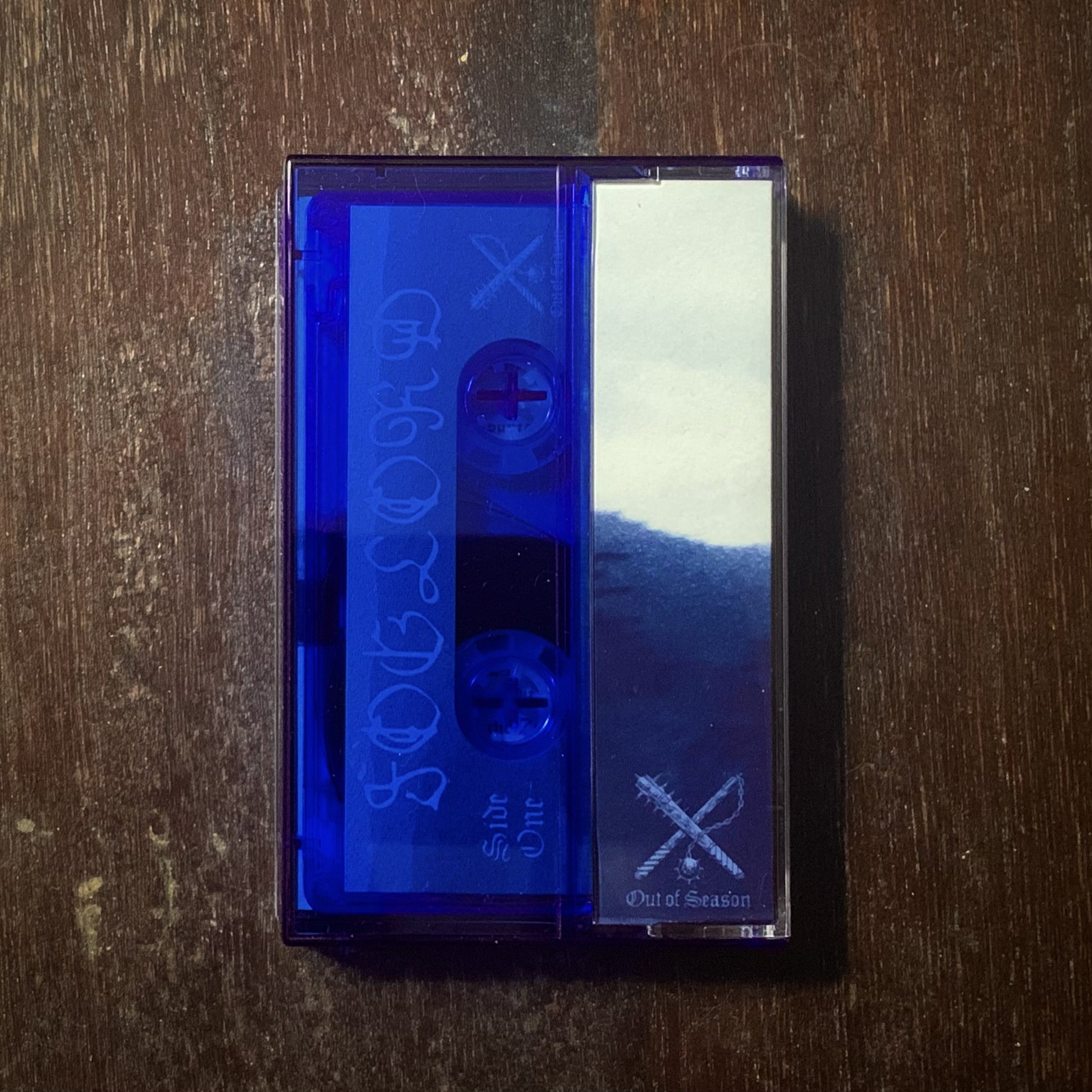 Blue cassette tape on a wooden surface