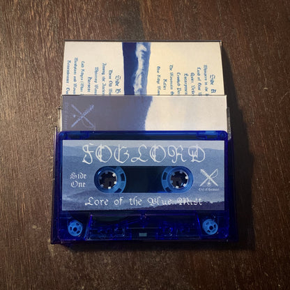 Blue cassette tape with white text on a wooden surface