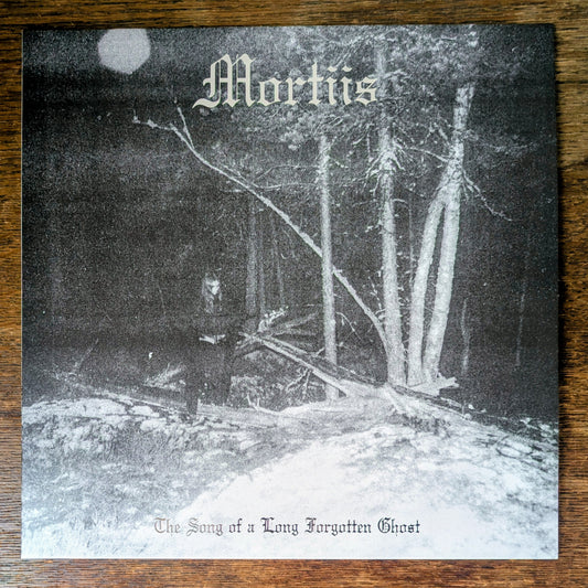 Album cover with a person in a forest, featuring the title 'Mortiis' and 'The Song of a Long Forgotten Ghost'.