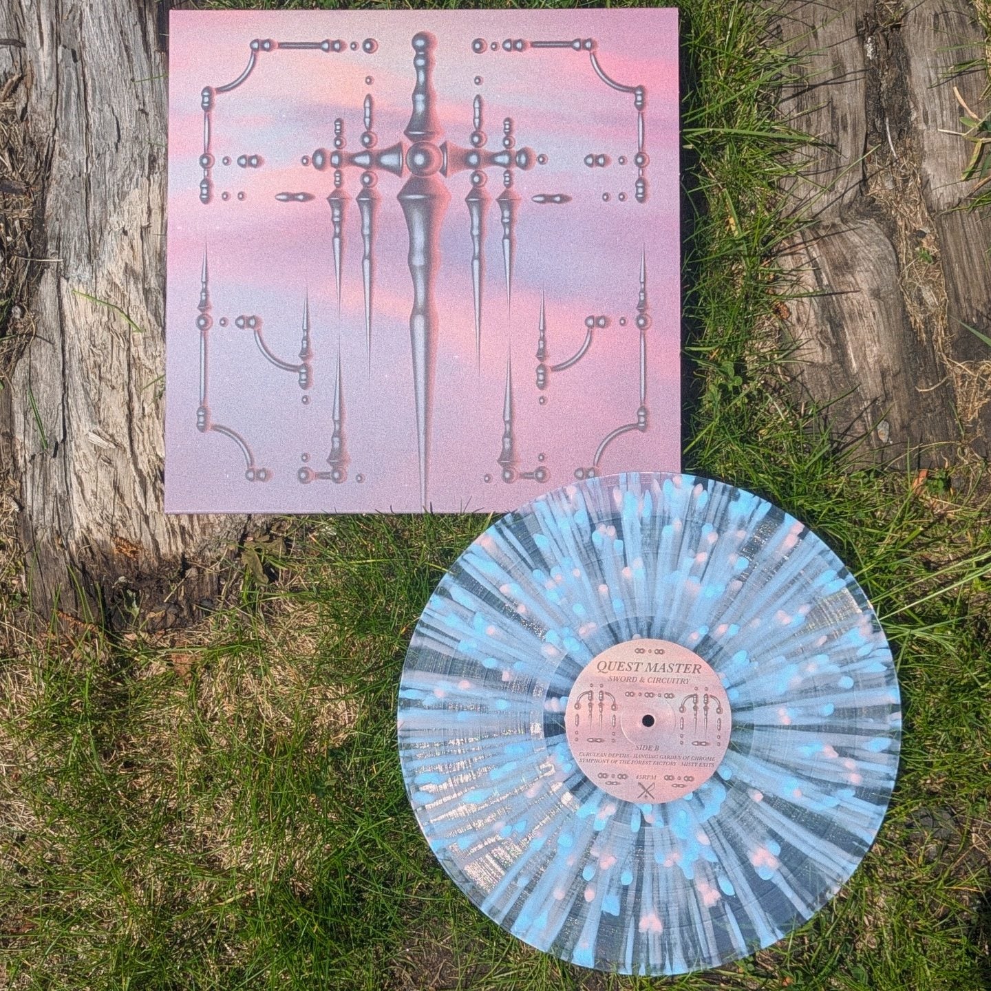 Vinyl record with a matching cover on grass