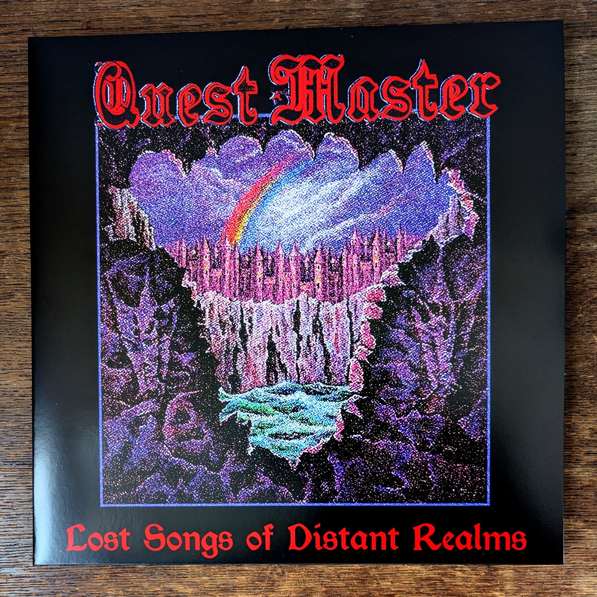 Album cover for 'Lost Songs of Distant Realms' by 'Quest Master' with a fantasy landscape design.