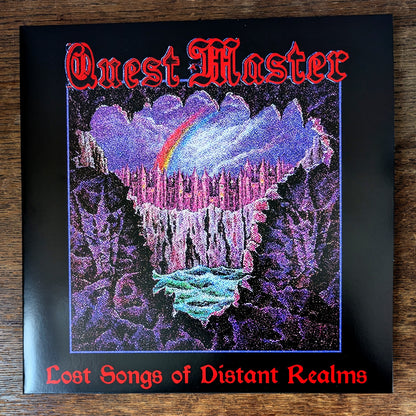Album cover for 'Lost Songs of Distant Realms' by 'Quest Master' with a fantasy landscape design.