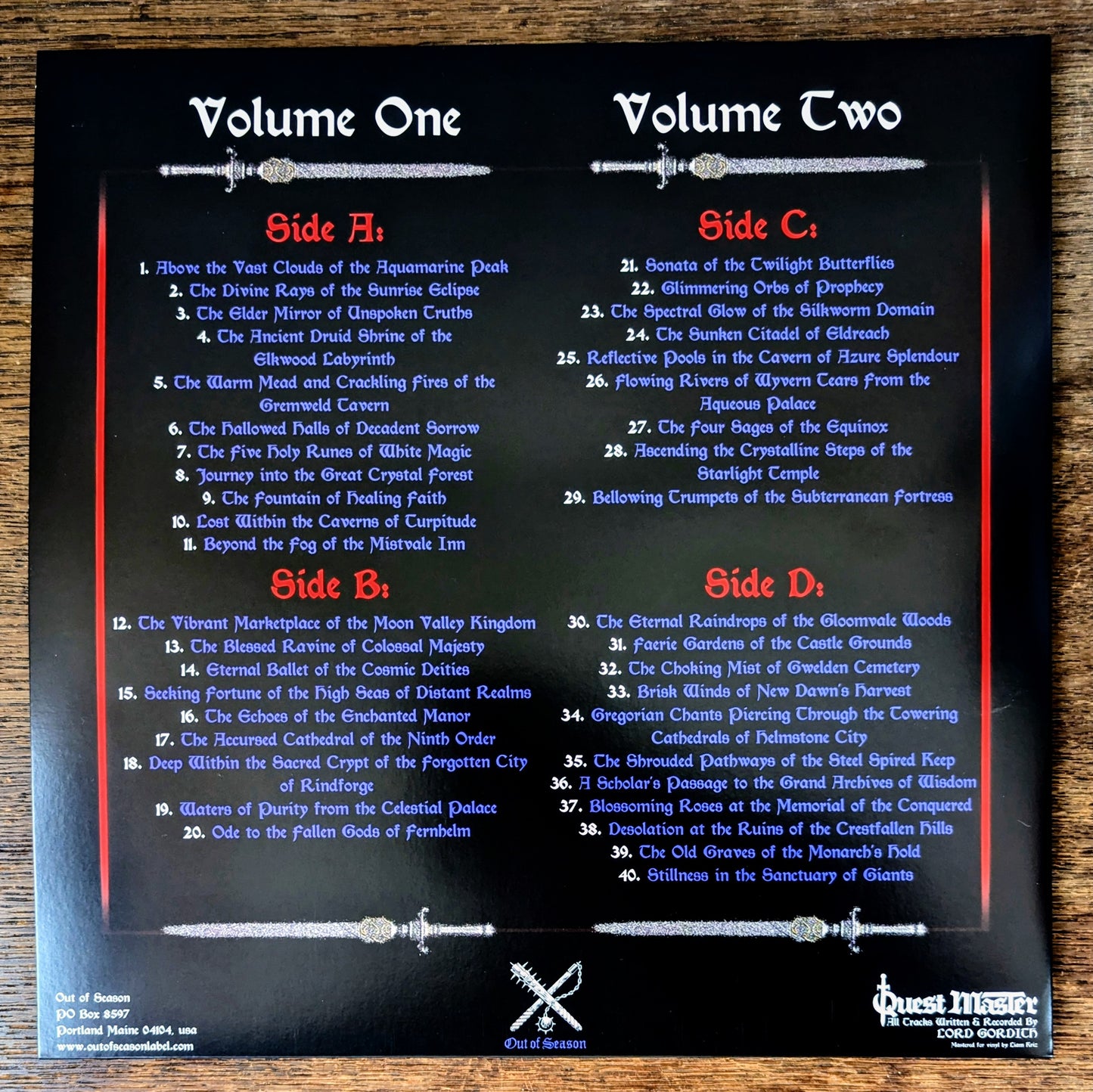 Album table of contents with side A, B, C, and D listings on a black background.