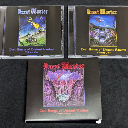 'Quest Master' music albums on a black surface