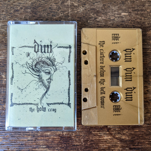 DIM "The Holy Crag" Cassette Tape, gold shell with black print, Norelco case and printed j-card